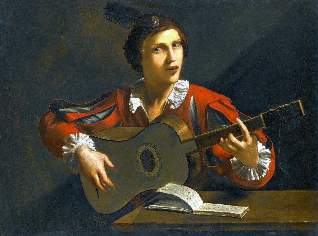 A 5 course baroque guitar and player. The painting is attributed to Italian artist Pietro Paolini, 1603–1681.
