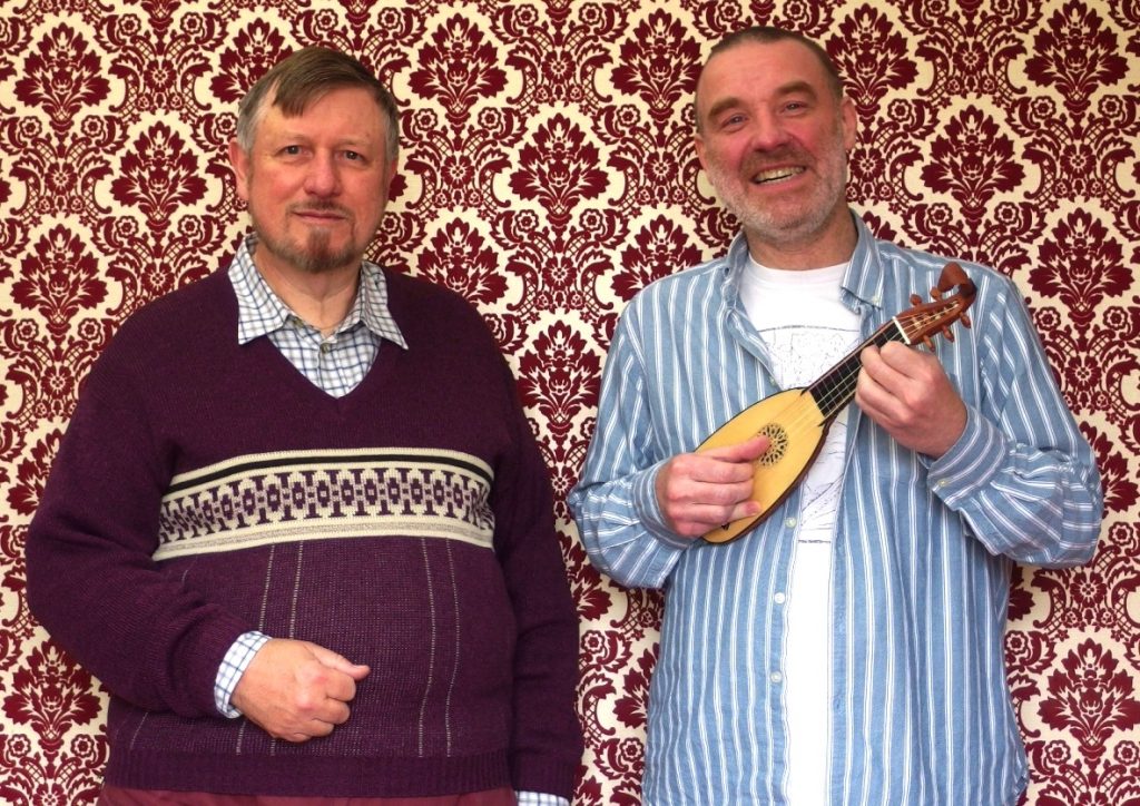 Mandore maker, Paul Baker, next to its happily playing owner, Ian Pittaway.